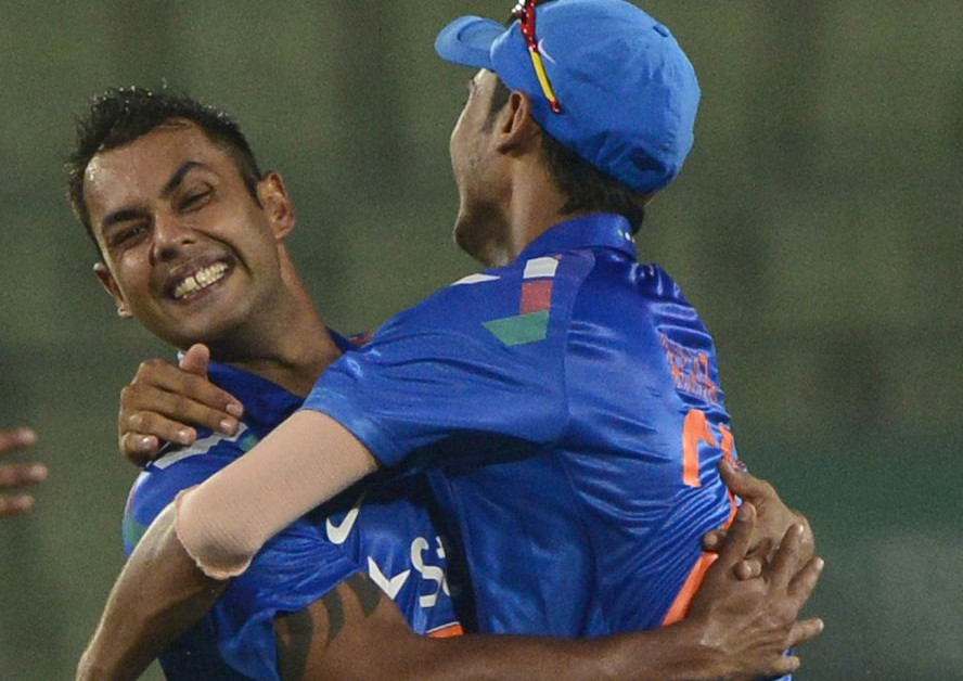 Stuart Binny took 6 for 4. Photo:AFP)