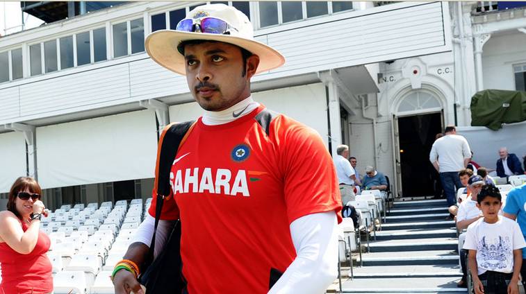 Sreesanth walks into the field for net practice in a match