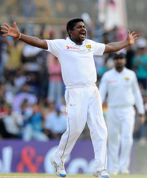 Rangana Herath celebrates as he takes 9 wickets for the team in an innings and becomes the first left-hander to take 9 wickets in an innings  (Image Source : AFP )