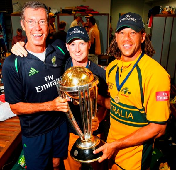 Coach John Buchanan, Michael Clarke and Andrew Symonds of Australia
