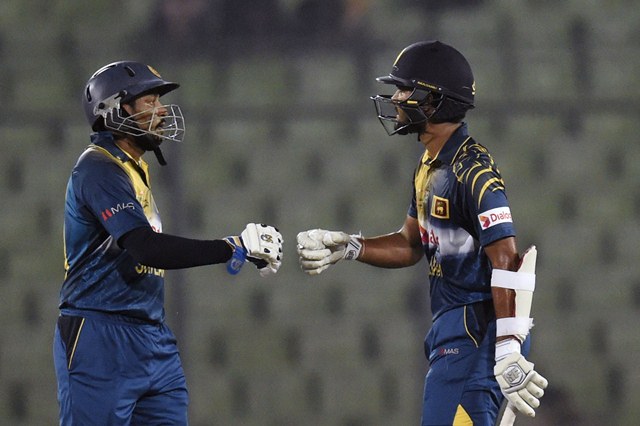 Dinesh Chandimal with teammate Tillakaratne Dilshan vs Pakistan