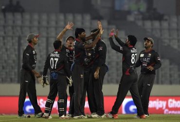 United Arab Emirates cricketers celebrate after the dismissal