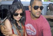 Indian cricket captain Mahendra Singh Dhoni and his wife Sakshi arrive at the airport in Kolkata on July 8, 2010. Dhoni and Sakshi married in a hush-hush ceremony on July 4 at a farmhouse near Dehradun. AFP PHOTO/STR (Photo credit should read STRDEL/AFP/Getty Images)