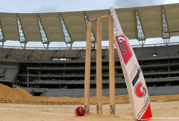 Cricket stumps, bat and ball