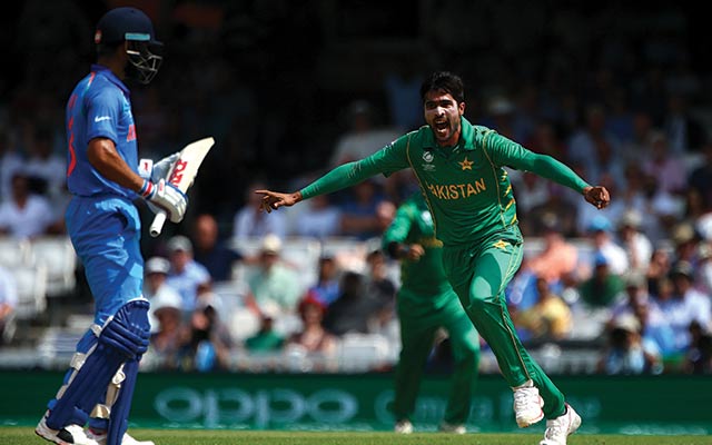 Mohammad Amir of Pakistan celebrates after claiming the wicket of India's Virat Kohli left-handed XI