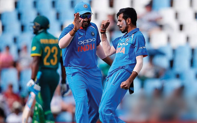 Yuzvendra Chahal and Rohit Sharma of India