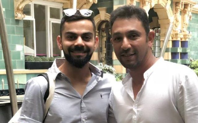Azhar Mahmood and Virat Kohli