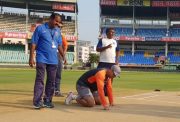 MS Dhoni inspecting the pitch
