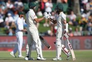 Aiden Markram of South Africa is congratulated by Hashim Amla