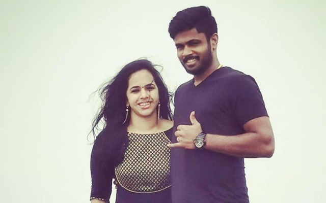 Sanju Samson and his wife - CricTracker