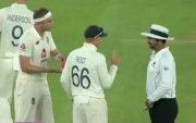 Joe Root with the umpire