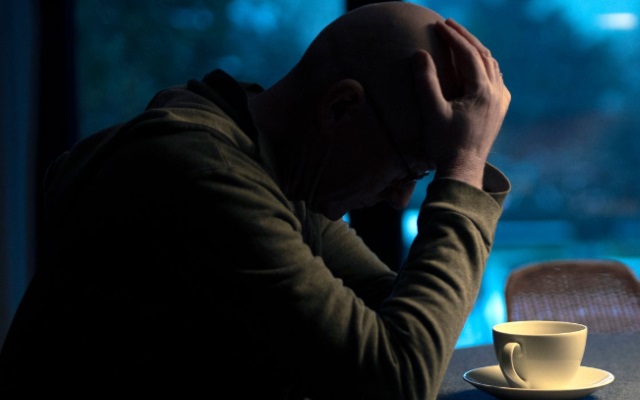 A man sitting in the Kitchen