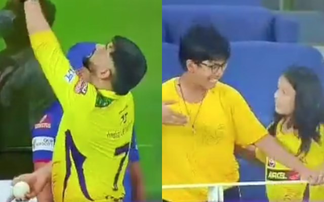 MS Dhoni gives a signed ball to a fan