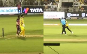 Umpire Chris Gaffney shielding MS Dhoni during a match against RR