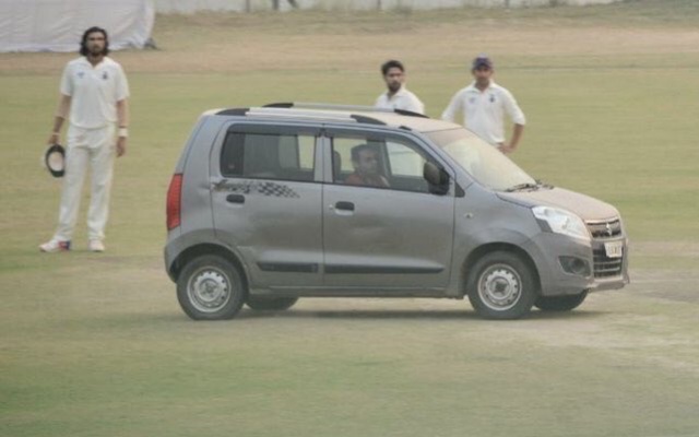 Man driving a car on the pitch in Delhi vs Uttar Pradesh match in 2017