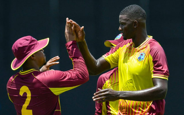 Jason Holder with his teammates