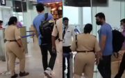 MS Dhoni spotted talking to an lady officer at Airport